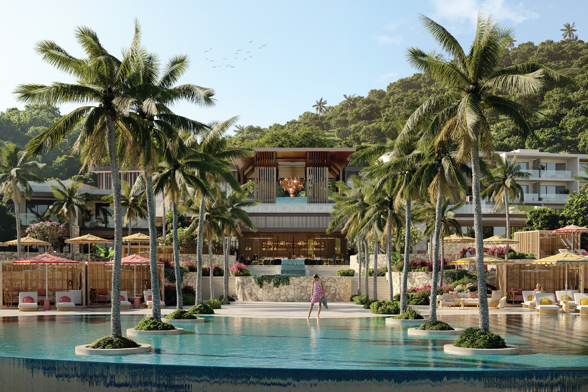 A luxurious tiered infinity pool at the Setai St. Maarten resort, framed by tall palm trees and lush tropical landscaping, leading up to an elegant open-air lobby pavilion with a golden sculpture centrepiece.